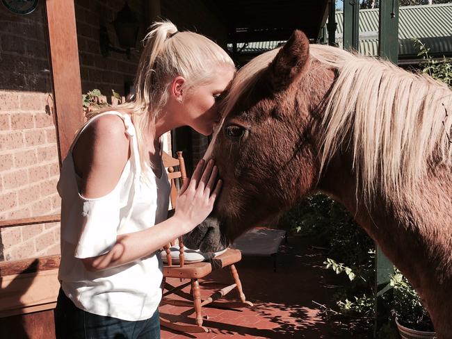 Clare Wainwright, 28, of Elanora Heights with her beloved horse Shelley, 30. Picture: Supplied.