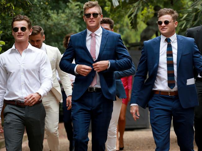 GWS Giants’ teammates including Adam Tomlinson (centre) and Heath Shaw (right) were guests at the wedding. Picture: Toby Zerna