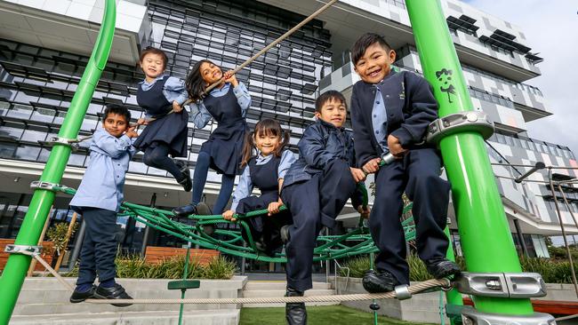 South Melbourne Primary students Shreyam, Aletheia, Joshua, Yan See, Zoey and Derrick will see more schools like theirs around the city. Picture: Tim Carrafa