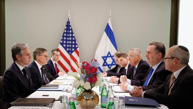 Antony Blinken, left, meets Israel's Foreign Minister Israel Katz, second right, in Tel Aviv on Tuesday. Picture: AFP