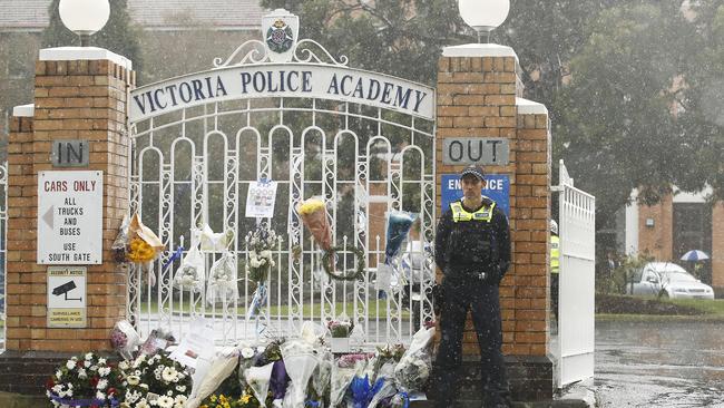 Flowers tributes at the Glen Waverley academy.