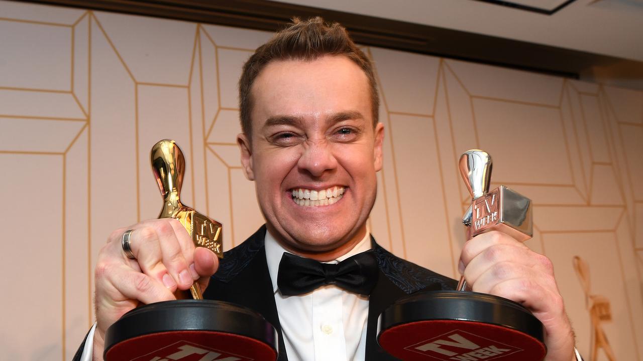 Grant Denyer, presenter of Family Feud, poses with his Gold Logie award. Picture: AAP Image/Dan Peled 