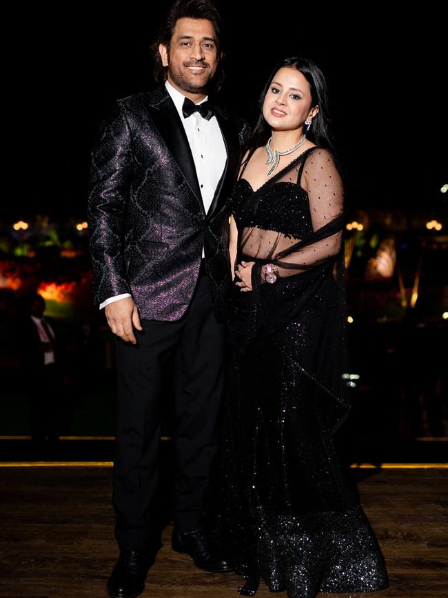 India's former cricket captain Mahendra Singh Dhoni (L) with his wife Sakshi Dhoni. Picture: Reliance / AFP