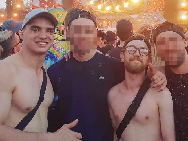 Instagram photo of Liam Anderson (2nd right with glasses) (nickname: Ranford Bigsby), son of Angry Anderson who is believed to have been murdered in a vicious assault at Queenscliff overnight. Another man has been arrested over the attack. Mathew Flame believed killer pictured with Liam Anderson (left, red shorts)Source: https://www.instagram.com/p/Bn45k_2H0la/