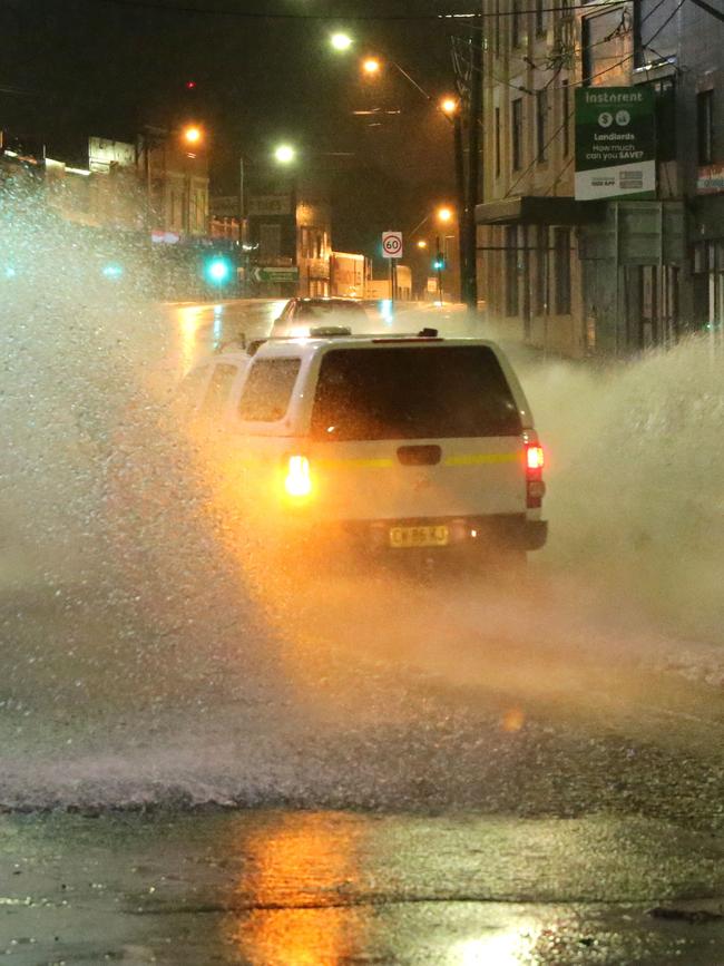 Constant rain caused roads to flood during the night. Parramatta Road at Five Dock and Taverners Hill overnight. Picture: Bill Hearne