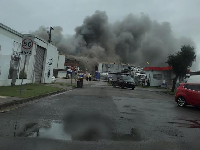 The fire is producing large amounts of smoke. Picture: Jen Tarran