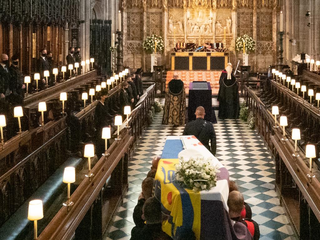 The Duke of Edinburgh’s coffin, covered with His Royal Highness’s Personal Standard is carried into The Quire. Picture: Getty Images