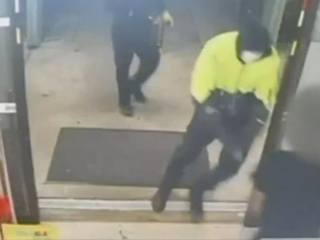 Two armed robbers have held up a supermarket at Trott Park demanding cash and cigarettes. Picture: 7NEWS