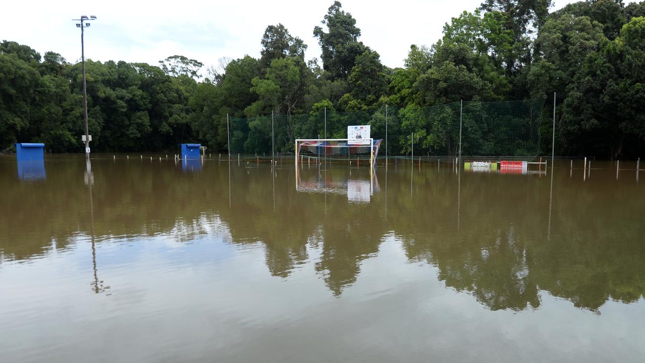 A football field is covered in floodwater in Woombye on the Sunshine Coast, Thursday, February 13, 2020. More than 200 millimetres of rain have fallen in the area since yesterday, causing floods. (AAP Image/Dan Peled) NO ARCHIVING