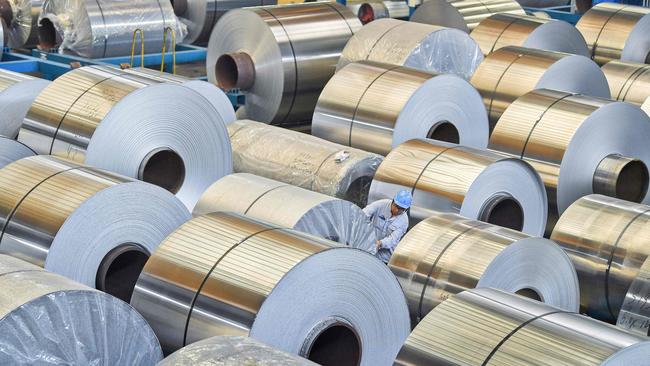 Strong demand is driving up prices for commodities including aluminium. Picture: AFP