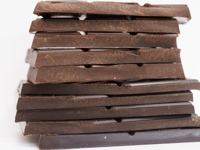 LONDON, ENGLAND - SEPTEMBER 18: In this photo illustration, bars of chocolate are stacked up on September 18, 2024 in London, England. The latest Which? food and drink inflation tracker shows chocolate prices have risen by 11% in the year to August 2024. Food and drink prices were up by 2.7% over the same period. The UK chocolate industry is worth 7bn annually. The increase is in part due to the effects of climate change with cocoa prices repeatedly hitting new records over the last year following poor harvests caused by unusual weather in West Africa. (Photo by Dan Kitwood/Getty Images)