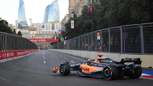 McLaren's Australian driver Daniel Ricciardo steers his car