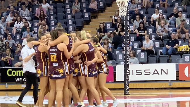 Matrics Netball Club players celebrate after winning the 2020 Premier League grand final.