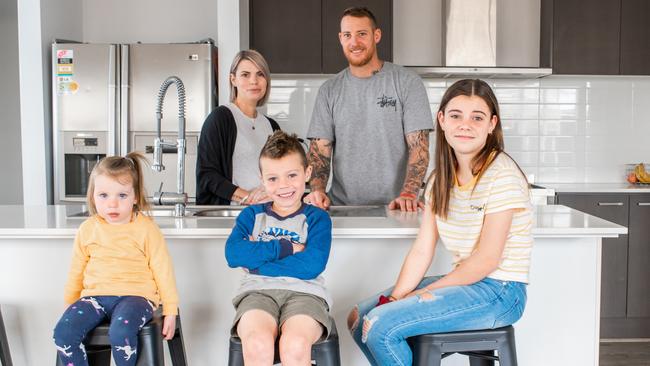 Jesse Cole and wife Chelsea and their children Wynter, 2, Knox, 5 (blue top) and Savannah, 11 (blue jeans) from Brookfield in Victoria who are fractional property investors.