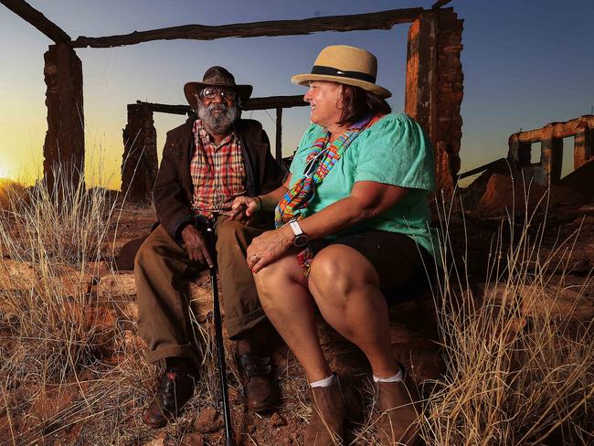 Lisa Feguson-Bissell and Helicopter Tjungurrayi at the Balgo Hills Mission ruins. Picture: Adam Head