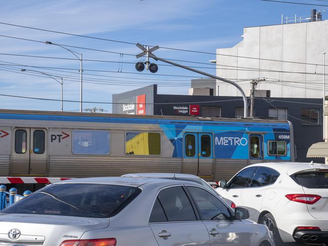 Traffic held up by boom gates on Glenroy and Harrington St in Glenroy, Tuesday, June 25, 2019. Traffic on Glenroy Rd has risen by 28% in the last 5 years. Commuters are blaming the Glenroy station level crossing, which is slated for removal as a key to the issue. Picture: Andy Brownbill