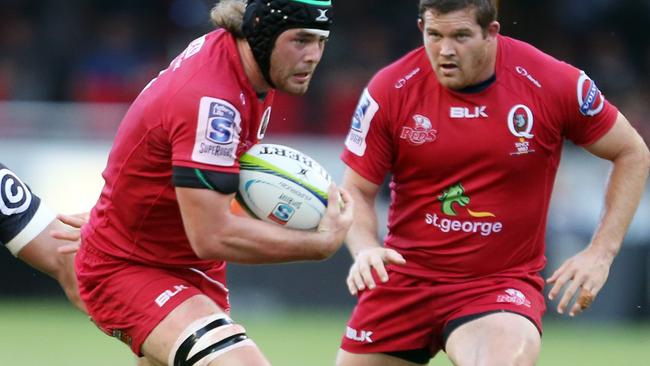 DURBAN, SOUTH AFRICA - MARCH 15: Willem Alberts of the Cell C Sharks looks to tackle Liam Gill of the Reds during the Super Rugby match between Cell C Sharks and Reds at Growthpoint Kings Park on March 15, 2014 in Durban, South Africa. (Photo by Steve Haag/Gallo Images/Getty Images)