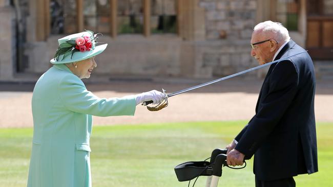 The wedding was the Queen’s second appointment on Friday, knighting 100 year-old Captain Tom Moore for raising tens of millions of pounds for the National Health Service