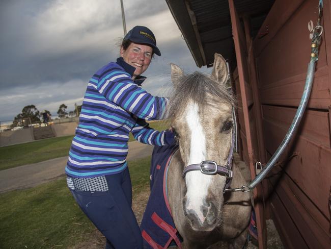 Dimity Chalmers giving her horse Wyann Lollipop a braid at the 2024 Swan Hill Show Picture: Noel Fisher.