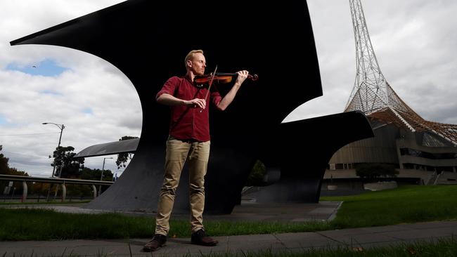 Dale Barltrop is taking part in the Melbourne Digital Concert Hall, in which orchestra musicians are giving virtual concerts from the Athenaeum Theatre. Picture: Aaron Francis