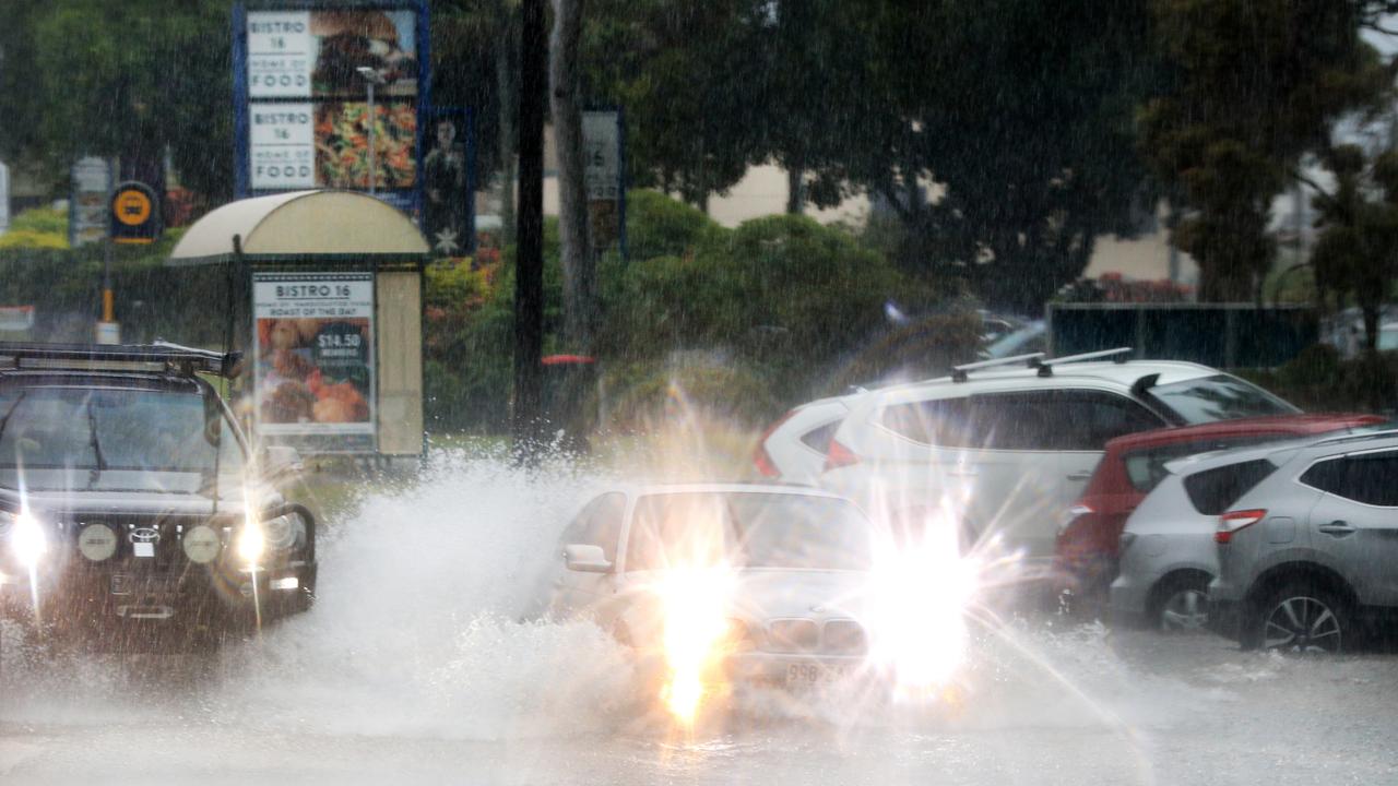 Rain floods roads in Tweed Heads | Daily Telegraph