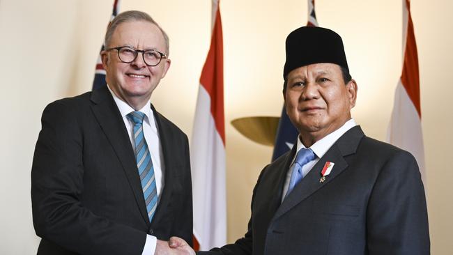 Indonesian Defence Minister and President-elect Prabowo Subianto is welcomed by Prime Minister Anthony Albanese at Parliament House in Canberra. Picture: NewsWire / Martin Ollman