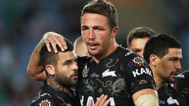 Rabbitohs Adam Reynolds celebrates a try Sam Burgess during NRL match South Sydney Rabbitohs v Penrith Panthers at ANZ Stadium. Picture. Phil Hillyard