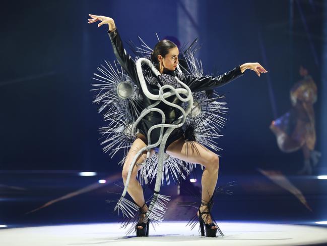 ‘Ouroboros’ by Srisha Arya and Kavya Kathuria from Pearl Academy in India is shown in the Avant-garde Section. An ouroboros is an ancient symbol often depicting a snake - or dragon - swallowing its own tail. Picture: Hagen Hopkins/Getty Images for World of WearableArt