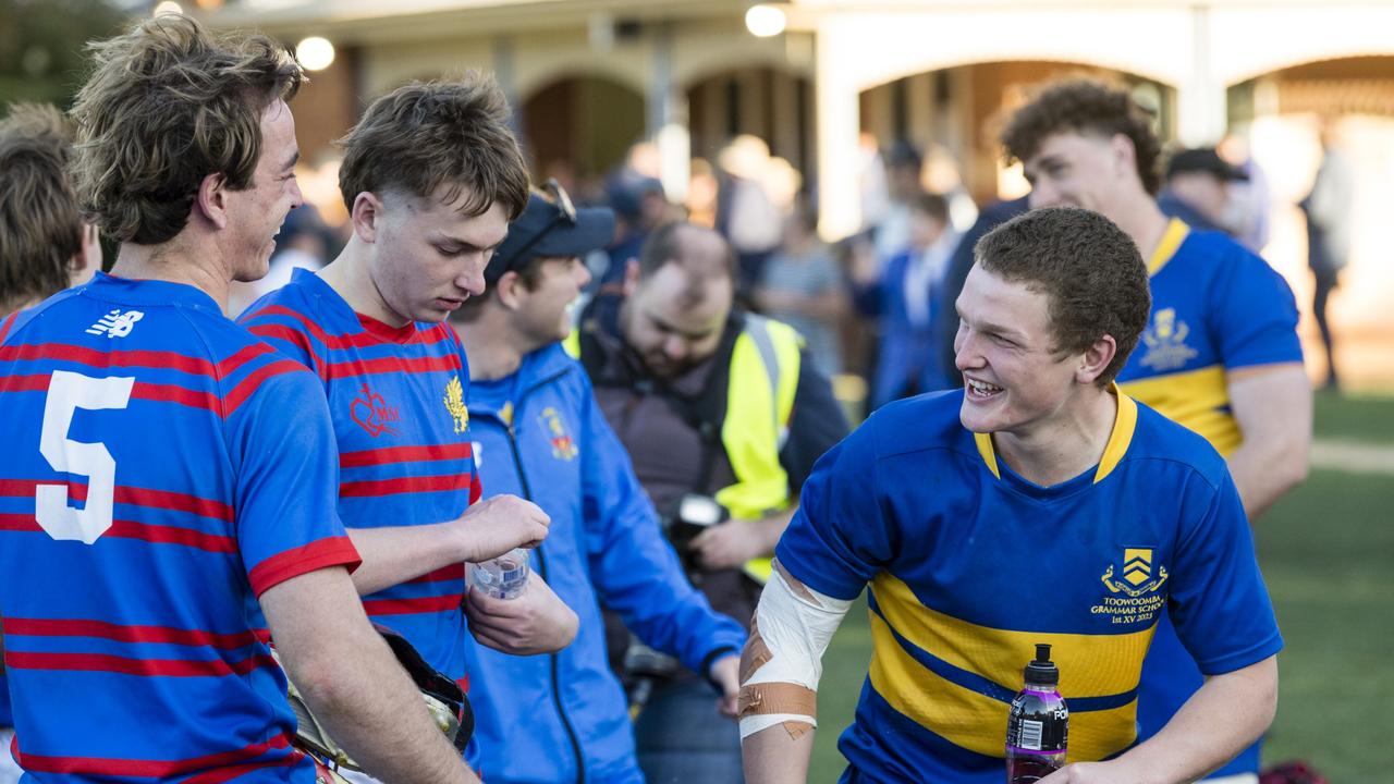 Hamish Loughnan (left) of Downlands and Joe Gray of Grammar share a joke after playing against each other.