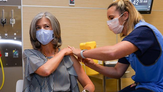 Nicola Spurrier gets her second vaccine from registered nurse Tovah Green at the RAH on Monday. Picture: Brenton Edwards