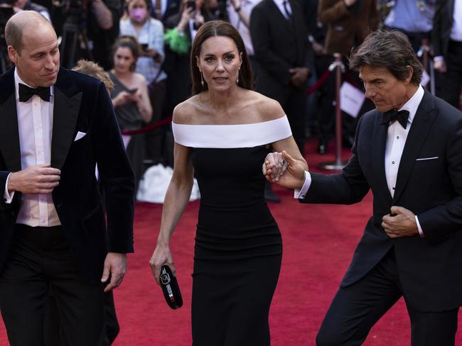 LONDON, ENGLAND - MAY 19: Prince William, Duke of Cambridge and Catherine, Duchess of Cambridge are accompanied by star actor Tom Cruise as they arrive for the "Top Gun: Maverick" Royal Film Performance at Leicester Square on May 19, 2022 in London, England. (Photo by Dan Kitwood/Getty Images)