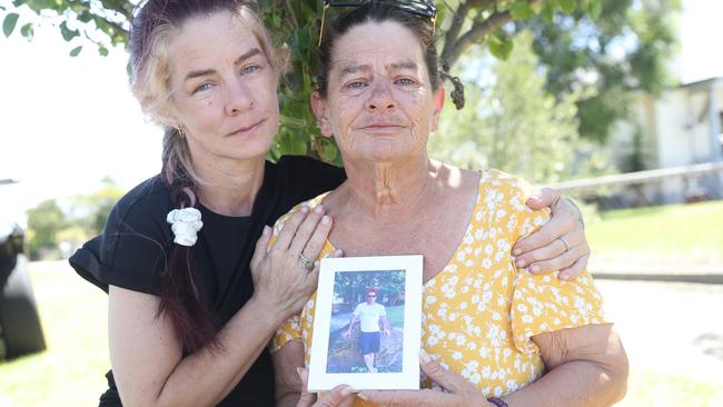 Kate Campbell and Tracy Campbell-Robinson with a picture of their brother and son, Jamie Campbell. Picture: Alan Barber