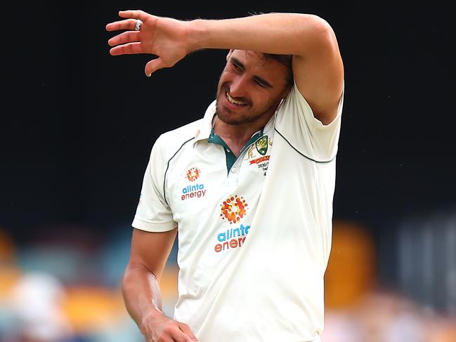 Australia's paceman Mitchell Starc reacts after bowling on day five of the fourth cricket Test match between Australia and India at The Gabba in Brisbane on January 19, 2021. (Photo by Patrick HAMILTON / AFP) / --IMAGE RESTRICTED TO EDITORIAL USE - STRICTLY NO COMMERCIAL USE--