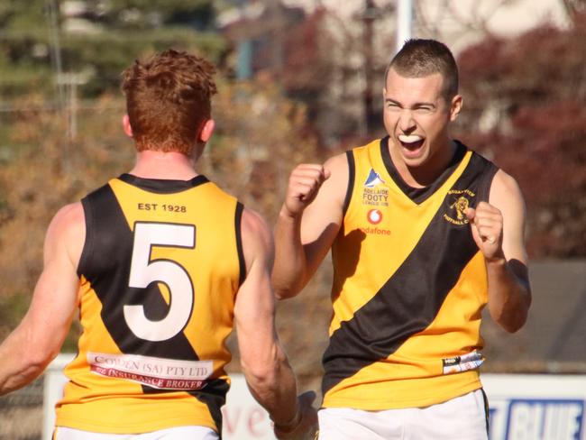 Jack Sausse (left) celebrates a goal with Joke Hodby during Broadview's win over PHOS Camden. Picture: Matt Oborn