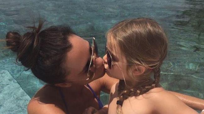 Victoria Beckham kisses daughter Harper. Picture: Instagram