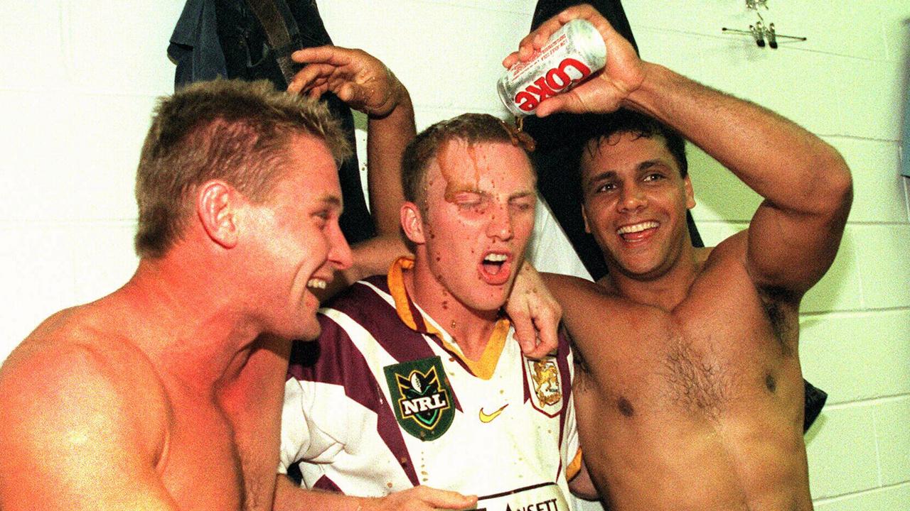 Darren Lockyer celebrates with John Plath (left) and Steve Renouf.