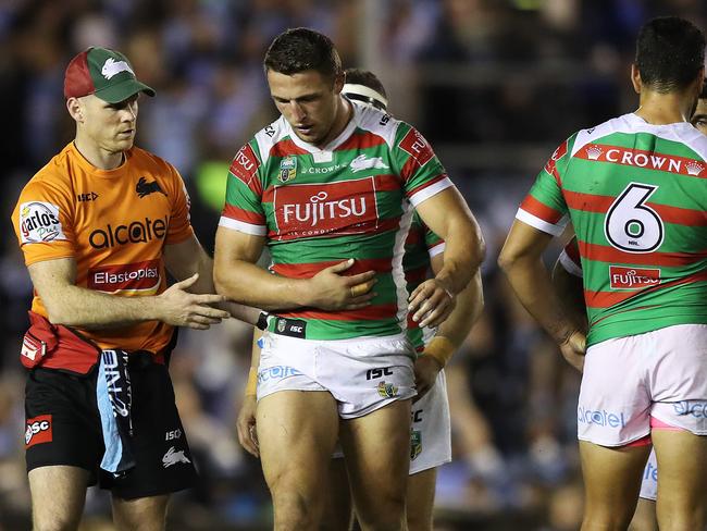 South Sydney’s Sam Burgess leaves the field with a rib injury. Picture: Getty Images