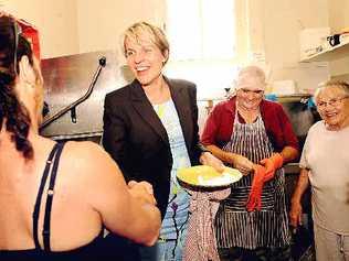 Federal Minister for Housing Tanya Plibersek (second left) dished it out at Lismore’s homeless shelter, with volunteers Ray Parry and Marg Helm. . Picture: Jacklyn Wagner