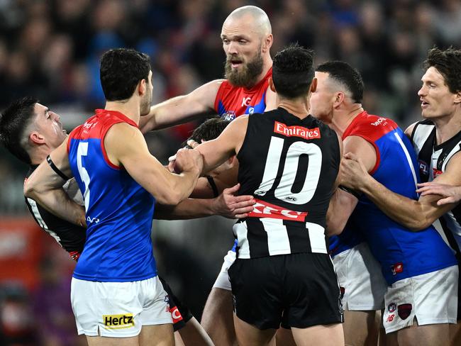 MELBOURNE, AUSTRALIA - SEPTEMBER 07: Demons players remonstrate with Brayden Maynard of the Magpies after Angus Brayshaw of the Demons was knocked out during the AFL First Qualifying Final match between Collingwood Magpies and Melbourne Demons at Melbourne Cricket Ground, on September 07, 2023, in Melbourne, Australia. (Photo by Quinn Rooney/Getty Images)