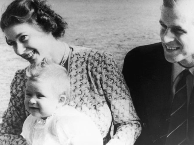 Princess Elizabeth (later Queen Elizabeth II of Great Britain) with her husband Prince Philip, Duke of Edinburgh and their baby son Prince Charles, July 1949.