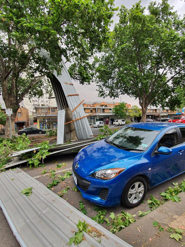 The debris smashed into a nearby car.