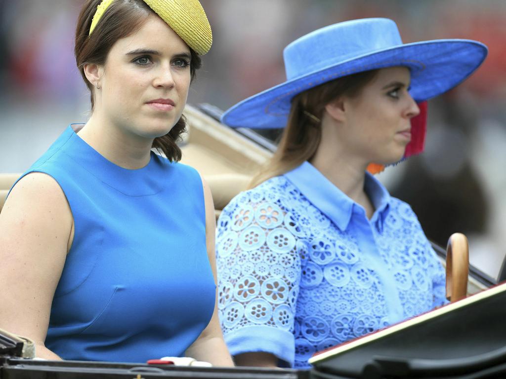 Princess Eugenie and Princess Beatrice also matched the Queen in blue dresses. Picture: Mike Egerton/PA via AP