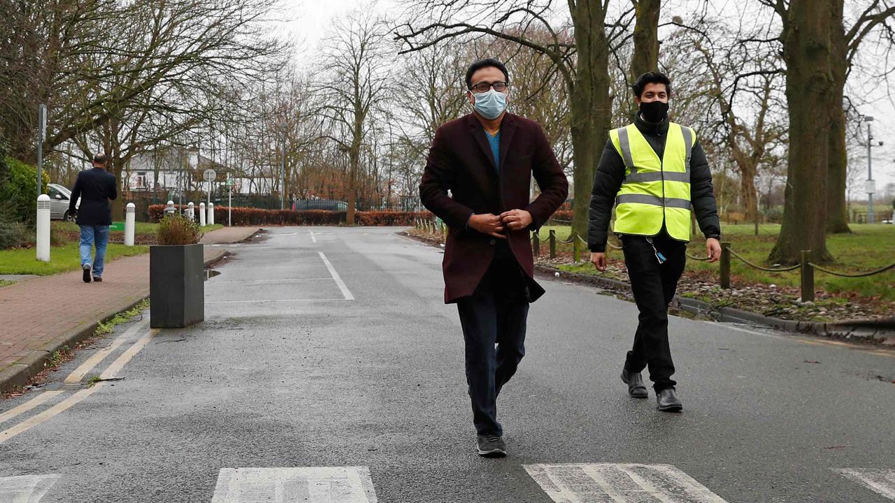 Unlike in Australia, hotel quarantine guest can leave their room for brief walks. Picture: Adrian Dennis/AFP