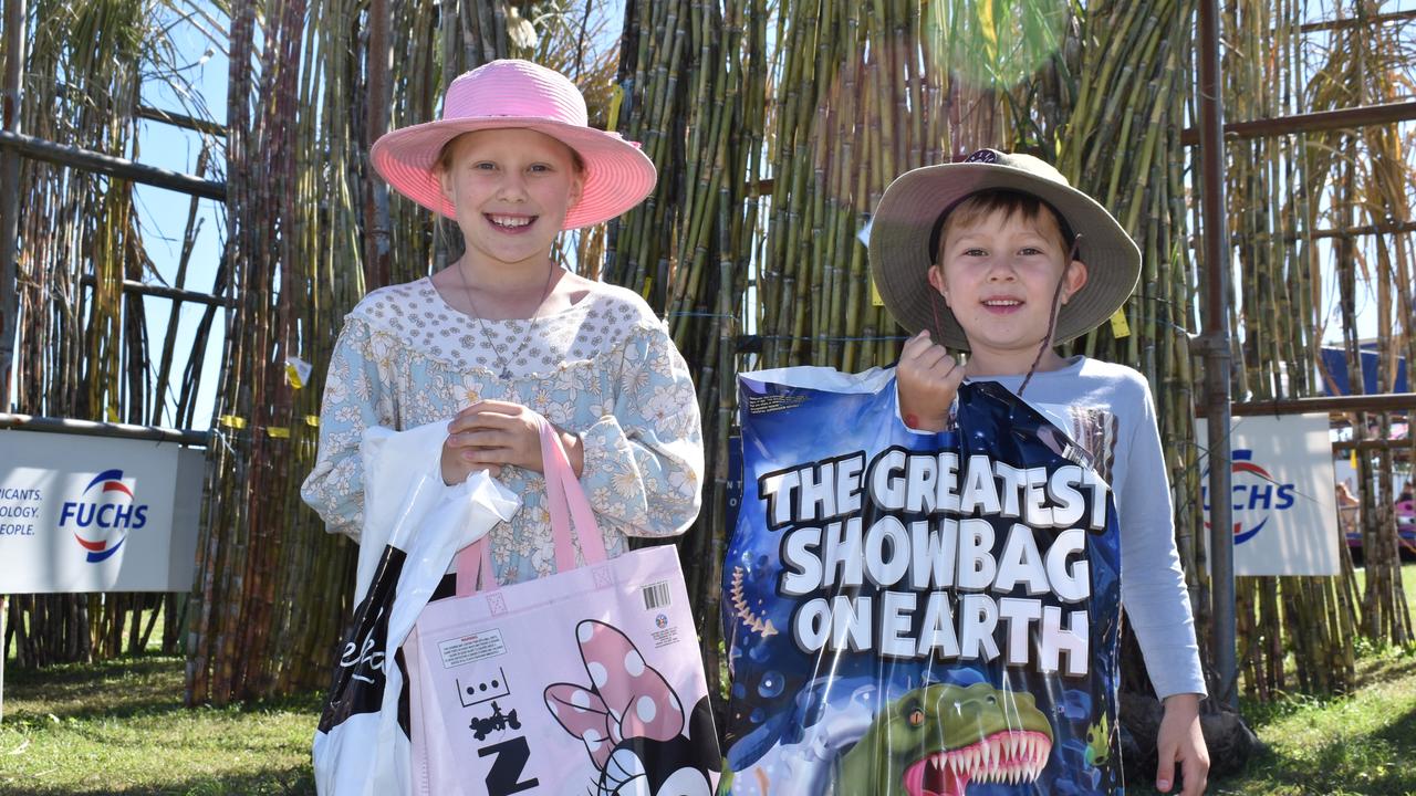 Parker and Ryan Clark of Cannonvale loved eating lollies and riding quad bikes at Show Whitsunday on Saturday. Picture: Kirra Grimes