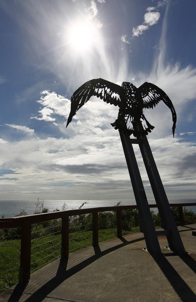 The winter sun shines through the eagle sculpture on Kirra Hill.