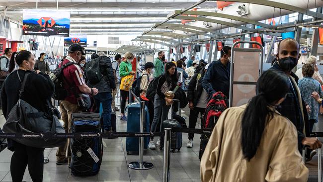 Federal Police arrested the Canadian man once the flight touched down in Sydney. Picture: NewsWire / Flavio Brancaleone