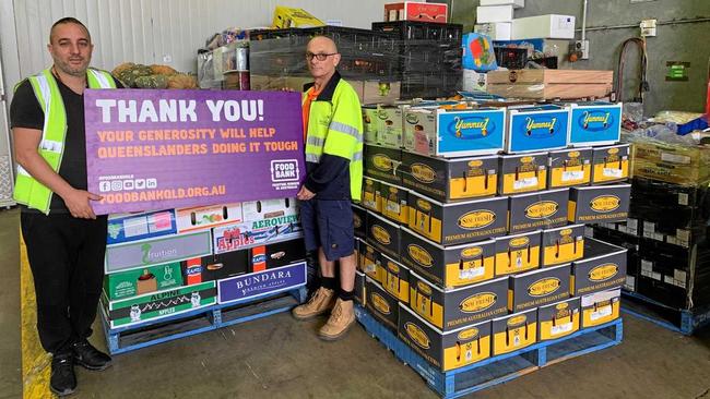 Fruit shop owner Habib Habchi with Food Bank logistics manager Dave Jackman.