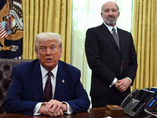 US President Donald Trump speaks in the Oval Office of the White House as he announces reciprocal tariffs, in Washington, DC, on February 13, 2025. Trump announced that he would impose "reciprocal tariffs" on trading partners, opening new fronts in his trade war. The move would match US tariff rates on imports to the levels that other countries impose on US goods. (Photo by ANDREW CABALLERO-REYNOLDS / AFP)