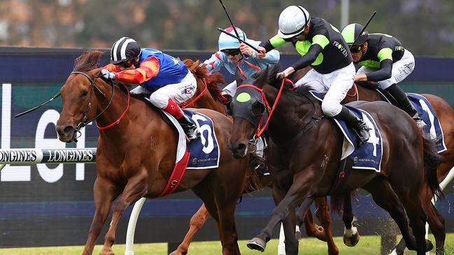 Craig Williams and Bella Nipotina (left) beats Private Eye (white cap) in the Giga Kick Stakes at Rosehill on Saturday. Picture: Getty Images