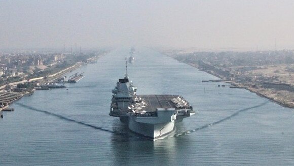 Britain is concerned about Chinese expansionism and the aircraft carrier HMS Queen Elizabeth passed through the Suez Canal on Tuesday on its way to “project influence” in the region. Picture: Royal Navy